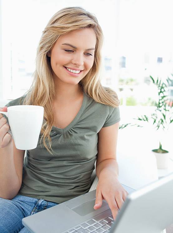 Woman taking a real estate course online